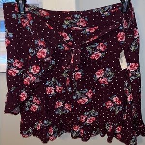 Maroon floral wrap skirt.